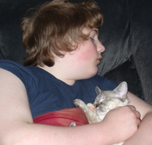 My son and our kitten sleeping.